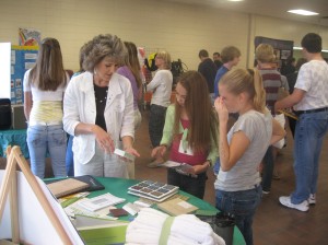Karen Hudspeth with Melaver demonstrates green products to students